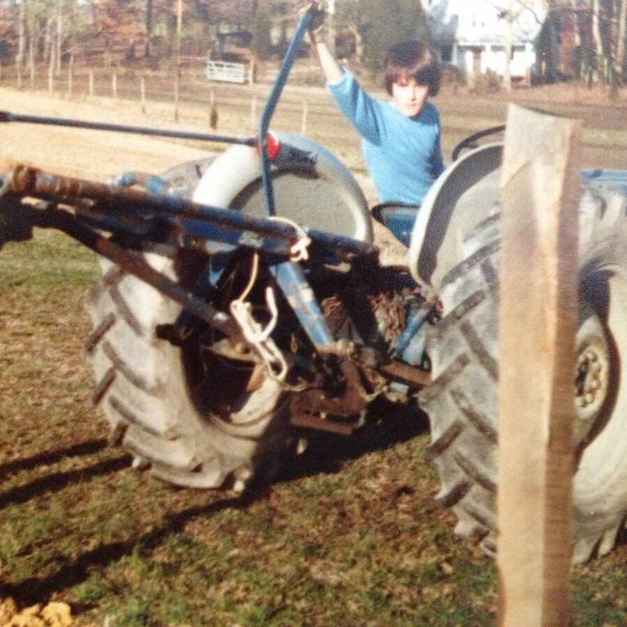 Nine-year-old Tony Wohlgemuth working on the farm in 1979, years before the haunted attraction began